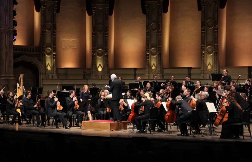 Full Orchestra performing in concert hall