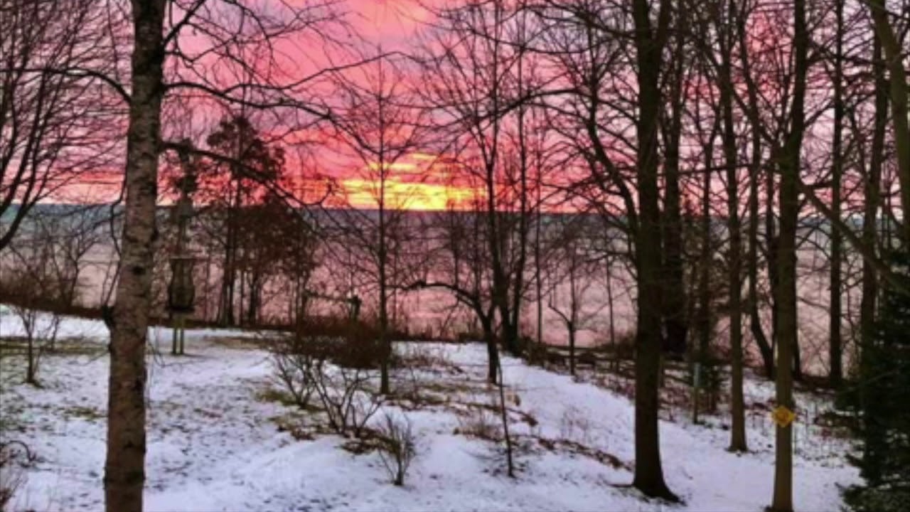 sunrise in winter over a lake