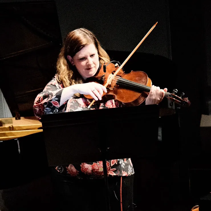 Elizabeth Reid playing her viola
