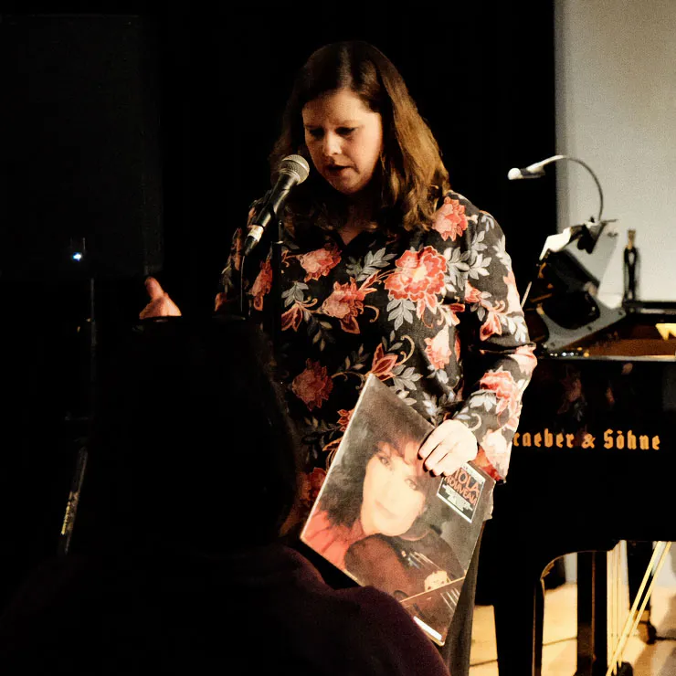 Elizabeth Reid – speaking at a microphone