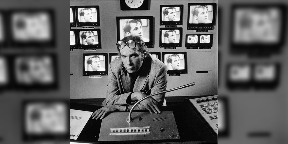 Glenn Gould leaning over a mixing console